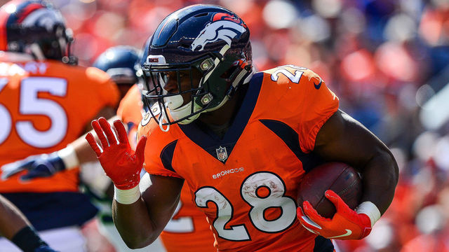 DENVER, CO - SEPTEMBER 9: Running back Royce Freeman #28 of the Denver Broncos carries the ball against the Seattle Seahawks at Broncos Stadium at Mile High on September 9, 2018 in Denver, Colorado.