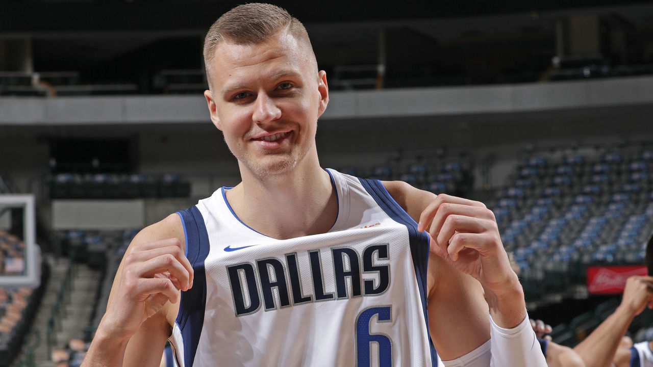 DALLAS, TX - APRIL 3: Kristaps Porzingis #6 of the Dallas Mavericks poses for a photo before the team photo shoot on April 3, 2019 at the American Airlines Center in Dallas, Texas. Mandatory Copyright Notice: Copyright 2019 NBAE