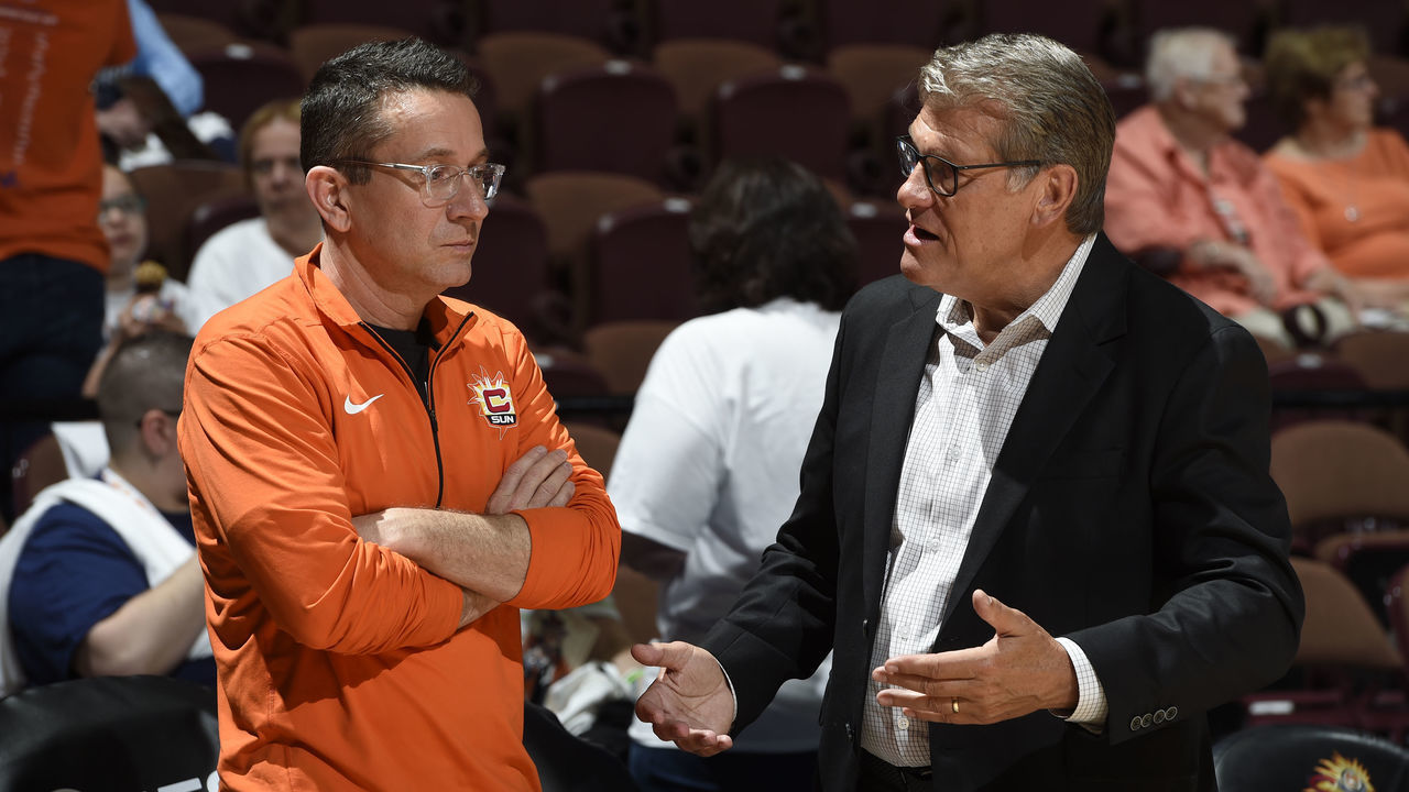 UNCASVILLE, CT - JUNE 16: Head Coach Curt Miller of the Connecticut Sun speaks to Head Coach Geno Auriemma of the UConn Women's Basketball Team before the game against the Seattle Storm on June 16, 2019 at the Mohegan Sun Arena in Uncasville, Connecticut. NOTE TO USER: User expressly acknowledges and agrees that, by downloading and/or using this photograph, user is consenting to the terms and conditions of the Getty Images License Agreement. Mandatory Copyright Notice: Copyright 2019 NBAE
