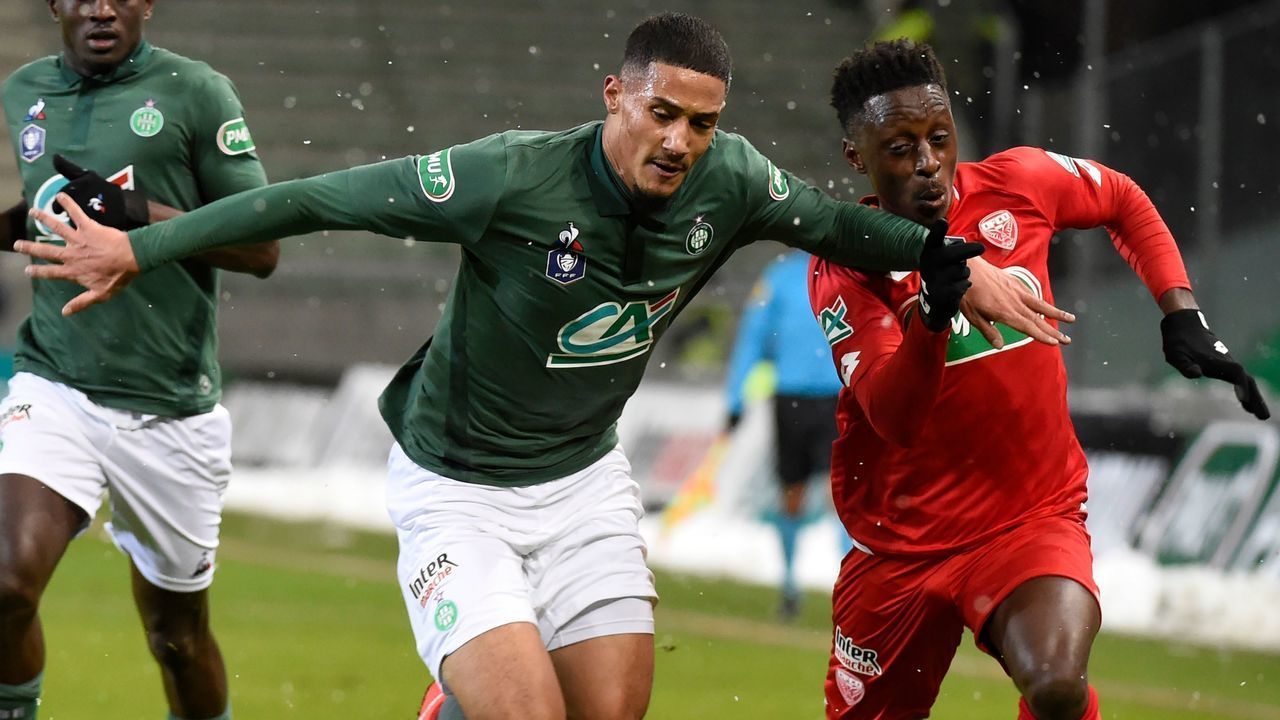 Saint-Etienne's French forward William Saliba (L) vies with Dijon's French-Togolese defender Arnold Bouka Moutou (R) during the French Cup round of 32 football match between Saint-Etienne (L1) and Dijon (L1), on January 23, 2019, at the Geoffroy Guichard Stadium in Saint-Etienne, central France.