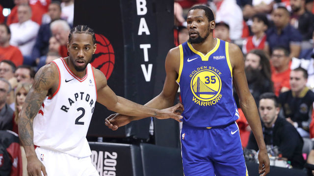 TORONTO, CANADA - JUNE 10: Kawhi Leonard #2 of the Toronto Raptors defends Kevin Durant #35 of the Golden State Warriors during Game Five of the NBA Finals on June 10, 2019 at Scotiabank Arena in Toronto, Ontario, Canada. NOTE TO USER: User expressly acknowledges and agrees that, by downloading and/or using this photograph, user is consenting to the terms and conditions of the Getty Images License Agreement. Mandatory Copyright Notice: Copyright 2019 NBAE