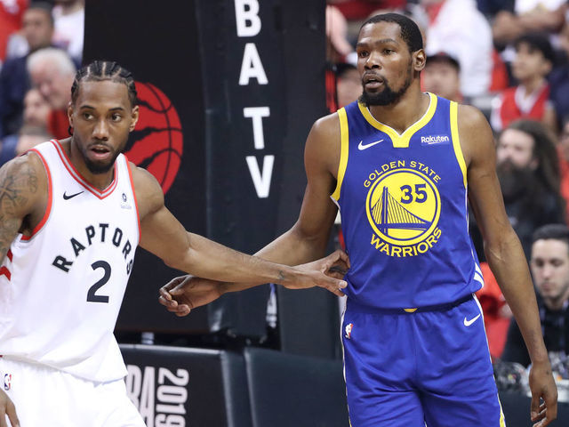 TORONTO, CANADA - JUNE 10: Kawhi Leonard #2 of the Toronto Raptors defends Kevin Durant #35 of the Golden State Warriors during Game Five of the NBA Finals on June 10, 2019 at Scotiabank Arena in Toronto, Ontario, Canada. NOTE TO USER: User expressly acknowledges and agrees that, by downloading and/or using this photograph, user is consenting to the terms and conditions of the Getty Images License Agreement. Mandatory Copyright Notice: Copyright 2019 NBAE