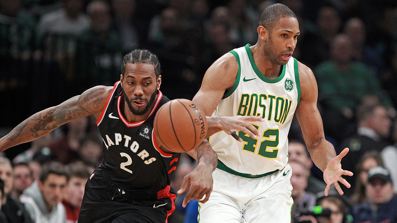 BOSTON, MA. - JANUARY 16: Kawhi Leonard #2 of the Toronto Raptors steals the ball from Al Horford #42 of the Boston Celtics during the first quarter of the NBA game at the TD Garden on January 16, 2019 in Boston, Massachusetts. (Staff Photo By Matt Stone/MediaNews Group/Boston Herald)
