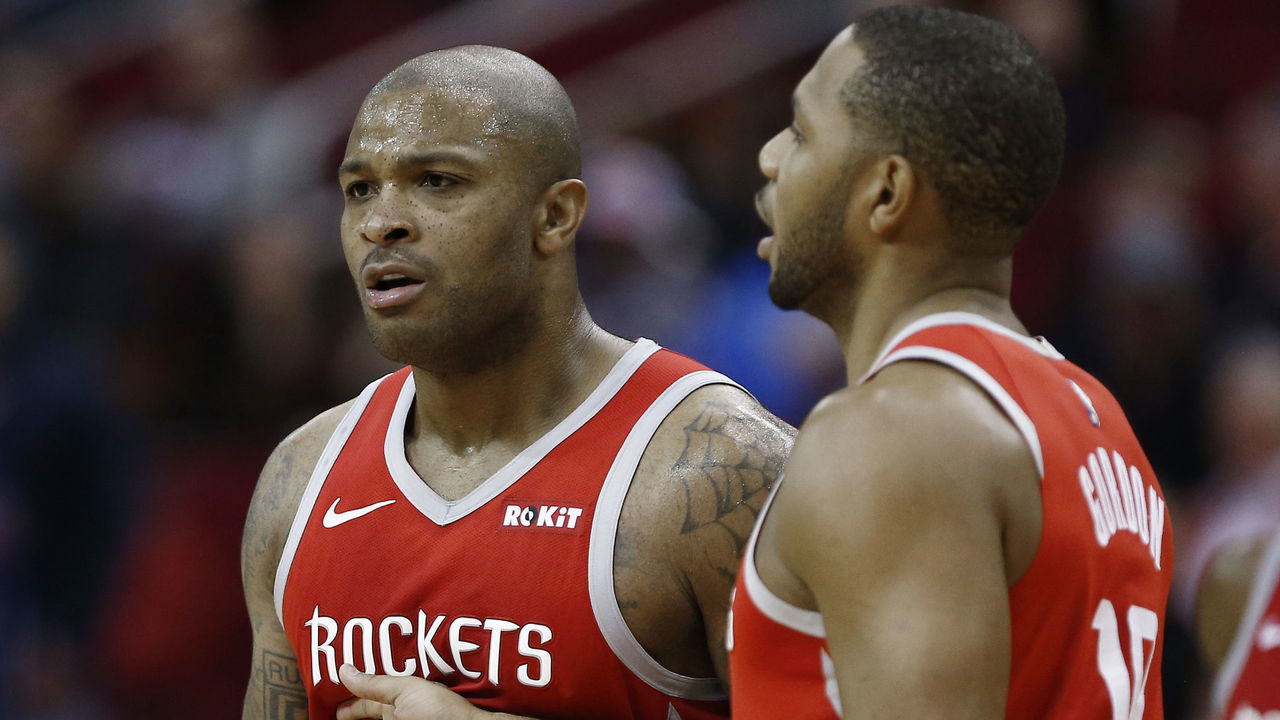 HOUSTON, TEXAS - NOVEMBER 21: PJ Tucker #17 of the Houston Rockets is restrained by Eric Gordon #10 after he was thrown out of the game for arguing a foul called on him during the third quarter against the Detroit Pistons at Toyota Center on November 21, 2018 in Houston, Texas.