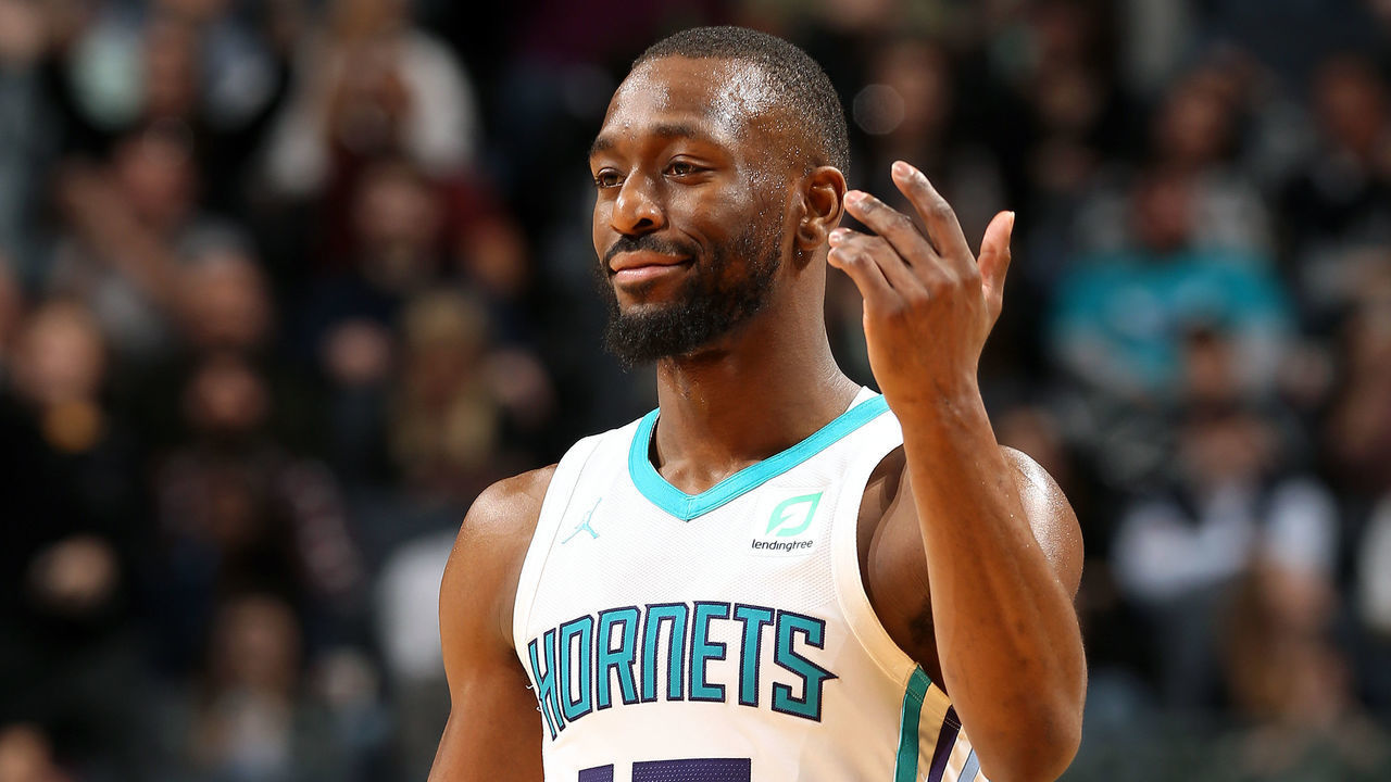 CHARLOTTE, NC - MARCH 26: Kemba Walker #15 of the Charlotte Hornets reacts to a play during the game against the San Antonio Spurs on March 26, 2019 at the Spectrum Center in Charlotte, North Carolina. NOTE TO USER: User expressly acknowledges and agrees that, by downloading and/or using this photograph, user is consenting to the terms and conditions of the Getty Images License Agreement. Mandatory Copyright Notice: Copyright 2019 NBAE