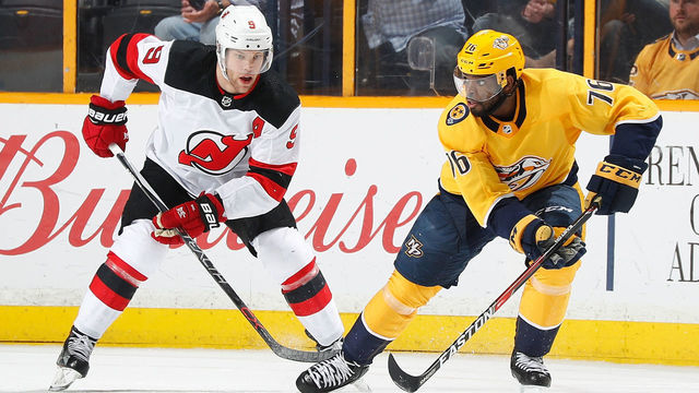 NASHVILLE, TN - MARCH 10: P.K. Subban #76 of the Nashville Predators skates against Taylor Hall #9 of the New Jersey Devils during an NHL game at Bridgestone Arena on March 10, 2018 in Nashville, Tennessee.