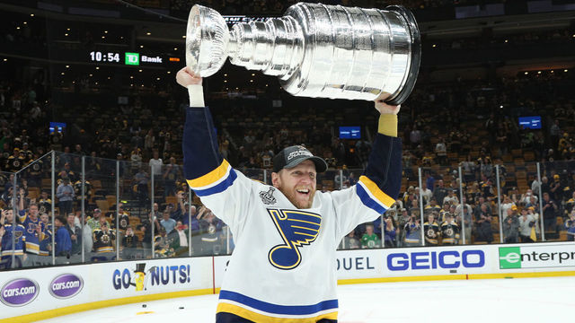 BOSTON, MASSACHUSETTS - JUNE 12: Carl Gunnarsson #4 of the St. Louis Blues hoists the Stanley Cup after the 2019 NHL Stanley Cup Final at TD Garden on June 12, 2019 in Boston, Massachusetts. The St. Louis Blues defeated the Boston Bruins 4-1 in Game 7 to win the Stanley Cup Final 4-3.