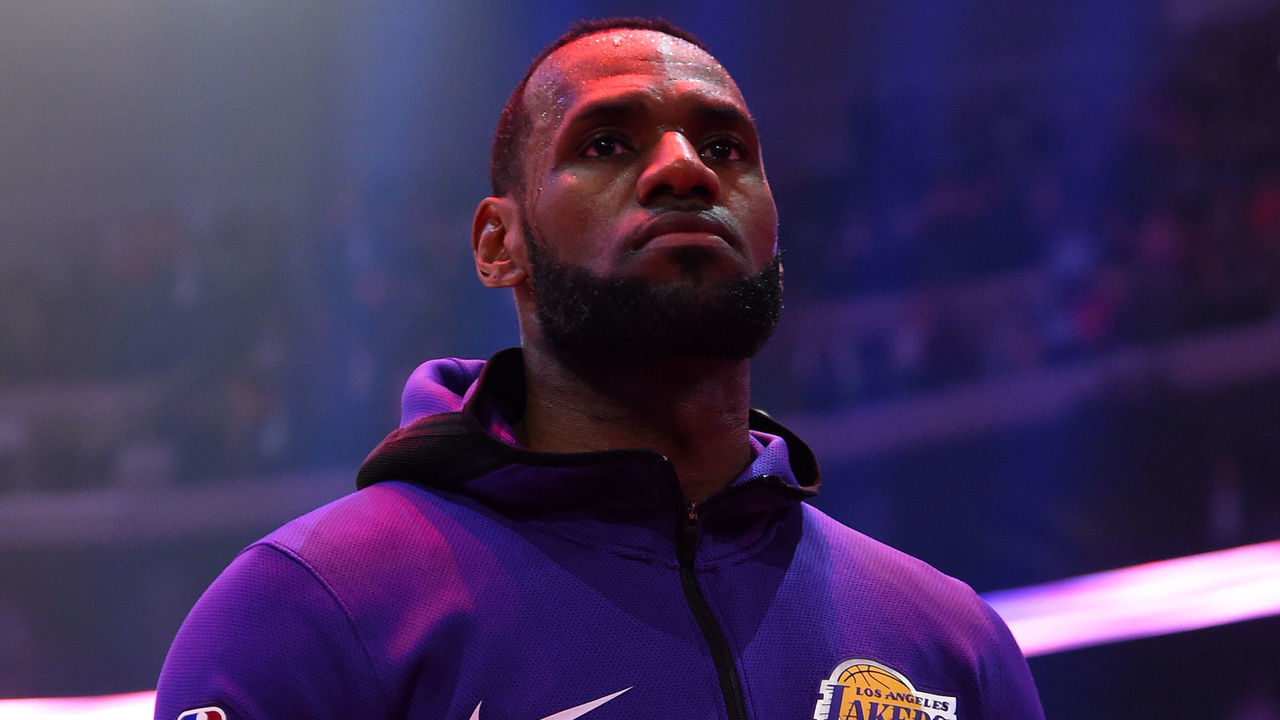 LOS ANGELES, CA - MARCH 26: LeBron James #23 of the Los Angeles Lakers stands for the National Anthem prior to a game against the Washington Wizards on March 26, 2019 at STAPLES Center in Los Angeles, California. NOTE TO USER: User expressly acknowledges and agrees that, by downloading and/or using this Photograph, user is consenting to the terms and conditions of the Getty Images License Agreement. Mandatory Copyright Notice: Copyright 2019 NBAE