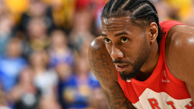 OAKLAND, CA - JUNE 13: Kawhi Leonard #2 of the Toronto Raptors looks on during Game Six of the NBA Finals against the Golden State Warriors on June 13, 2019 at ORACLE Arena in Oakland, California. NOTE TO USER: User expressly acknowledges and agrees that, by downloading and/or using this photograph, user is consenting to the terms and conditions of Getty Images License Agreement. Mandatory Copyright Notice: Copyright 2019 NBAE
