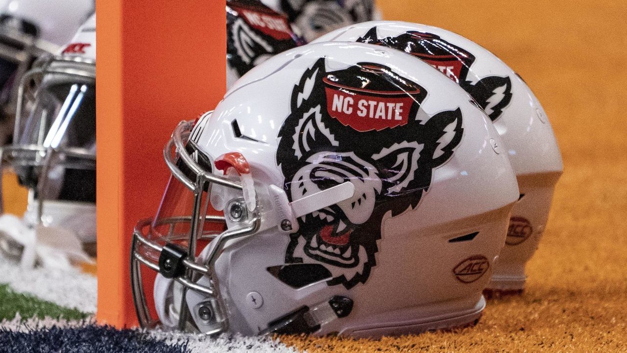 SYRACUSE, NY - OCTOBER 27: A North Carolina State Wolfpack Helmet on the field prior to the game between the North Carolina State Wolfpack and the Syracuse Orange on October 27, 2018, at the Carrier Dome in Syracuse, NY.