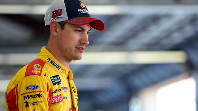 SONOMA, CALIFORNIA - JUNE 21: Joey Logano, driver of the #22 Shell Pennzoil Ford, stands in the garage area during practice for the Monster Energy NASCAR Cup Series Toyota/Save Mart 350 at Sonoma Raceway on June 21, 2019 in Sonoma, California.
