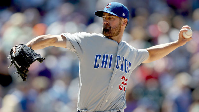 DENVER, COLORADO - JUNE 12: Starting pitcher Cole Hamels #35 of the Chicago Cubs throws in the seventh inning against the Colorado Rockies at Coors Field on June 12, 2019 in Denver, Colorado.