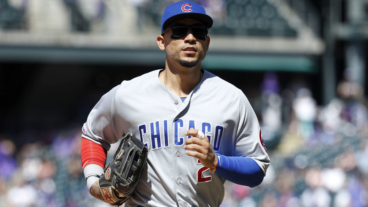 DENVER, CO - JUNE 12: Carlos Gonzalez #2 of the Chicago Cubs looks on while heading back to the dugout during a game against the Colorado Rockies at Coors Field on June 12, 2019 in Denver, Colorado. The Cubs won 10-1.