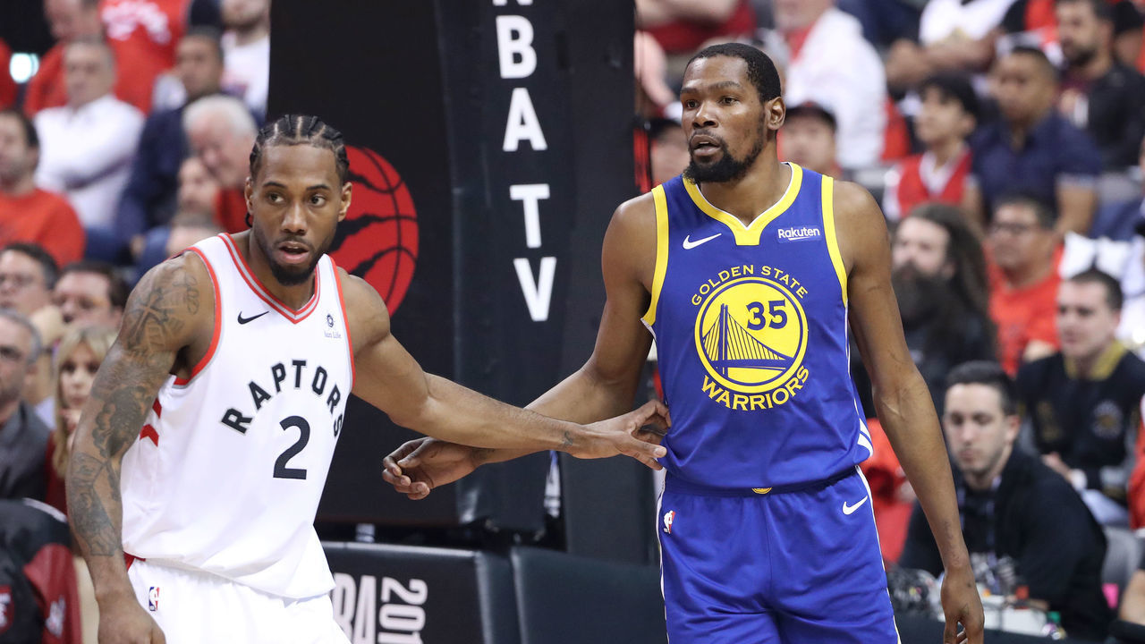 TORONTO, CANADA - JUNE 10: Kawhi Leonard #2 of the Toronto Raptors defends Kevin Durant #35 of the Golden State Warriors during Game Five of the NBA Finals on June 10, 2019 at Scotiabank Arena in Toronto, Ontario, Canada. NOTE TO USER: User expressly acknowledges and agrees that, by downloading and/or using this photograph, user is consenting to the terms and conditions of the Getty Images License Agreement. Mandatory Copyright Notice: Copyright 2019 NBAE