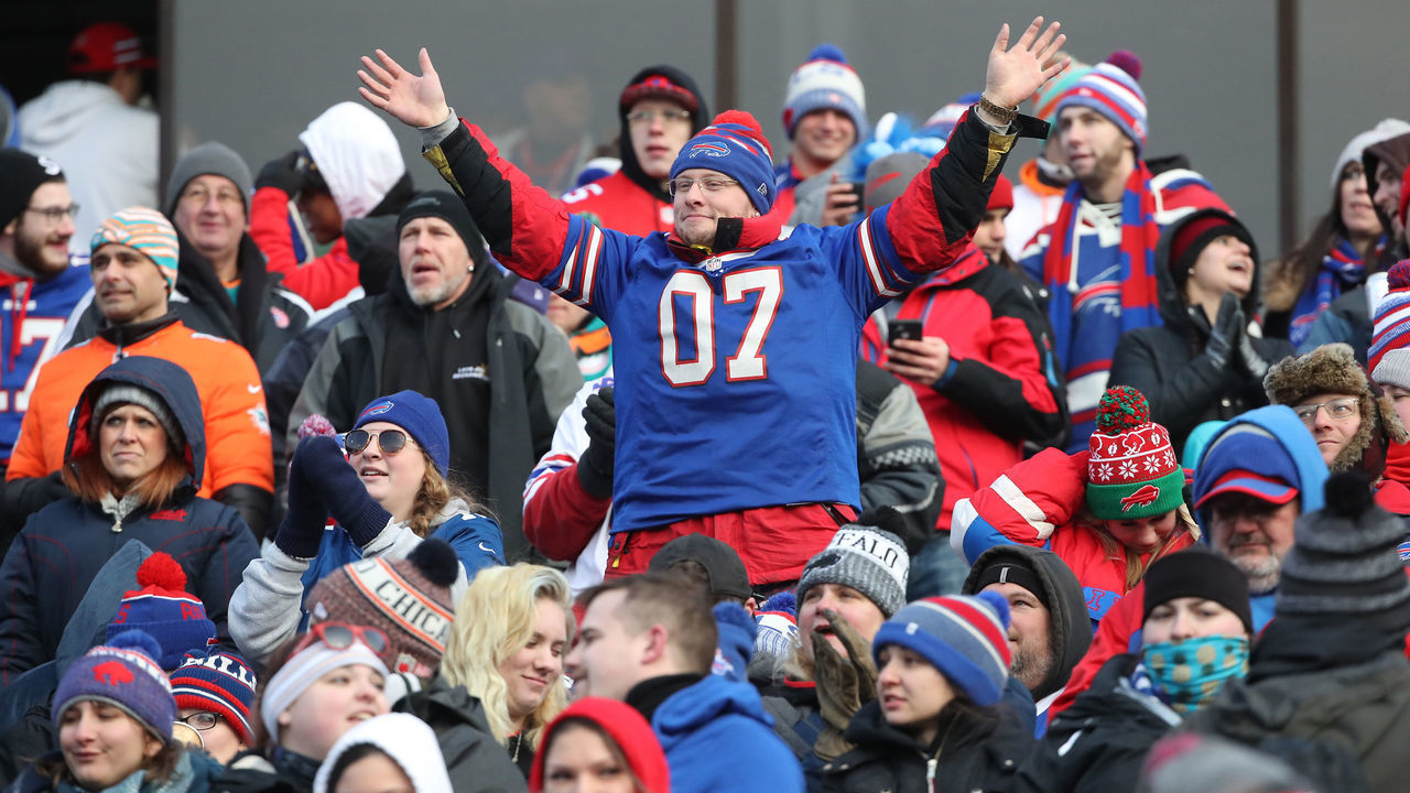 BUFFALO, NY - DECEMBER 30: A fan of the Buffalo Bills waves his arms as he cheers the Bills imminent victory in the late stages of their NFL game against the Miami Dolphins at New Era Field on December 30, 2018 in Buffalo, New York. *** Local Caption ***