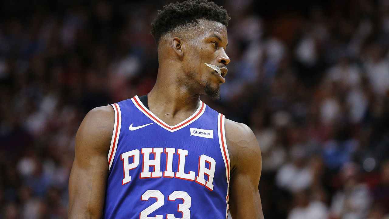 MIAMI, FLORIDA - APRIL 09: Jimmy Butler #23 of the Philadelphia 76ers reacts against the Miami Heat during the first half at American Airlines Arena on April 09, 2019 in Miami, Florida.