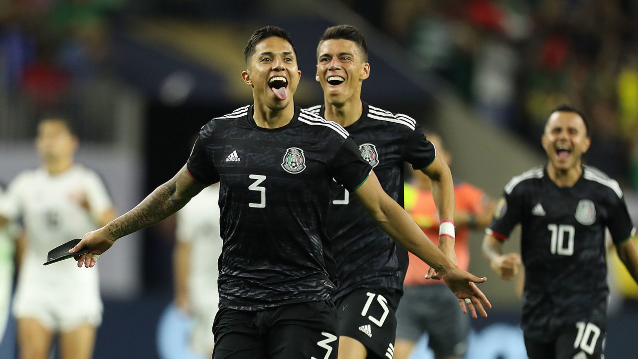 HOUSTON, TX - JUNE 29: Carlos Salcedo #3 and Hector Moreno #15 of Mexico celebrates their victory after a quarterfinal match between Mexico and Costa Rica as part of 2019 CONCACAF Gold Cup at NRG Stadium on June 29, 2019 in Houston, Texas.