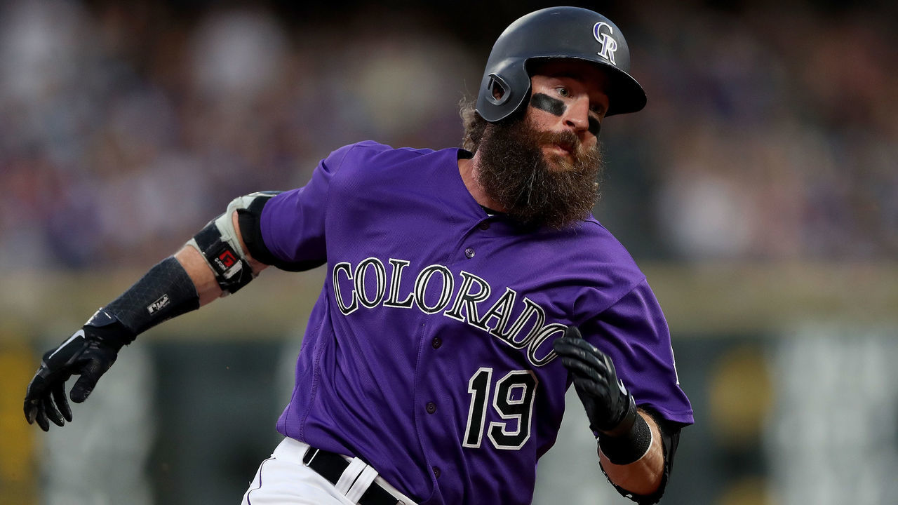 DENVER, COLORADO - JUNE 29: Charlie Blackmon #19 of the Colorado Rockies scores on a Nolan Arenado single in the sixth inning against the Los Angeles Dodgers at Coors Field on June 29, 2019 in Denver, Colorado.