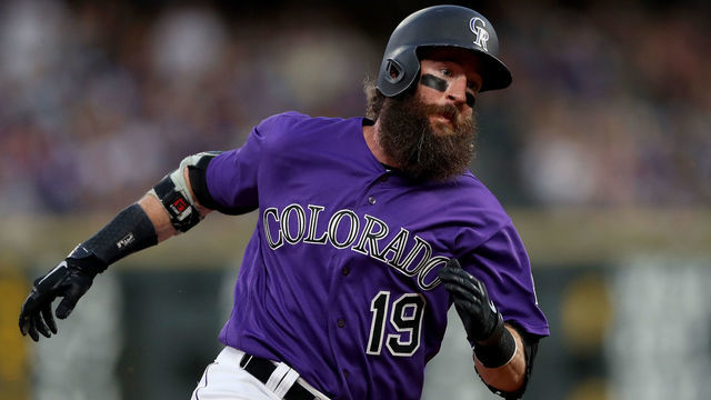 DENVER, COLORADO - JUNE 29: Charlie Blackmon #19 of the Colorado Rockies scores on a Nolan Arenado single in the sixth inning against the Los Angeles Dodgers at Coors Field on June 29, 2019 in Denver, Colorado.