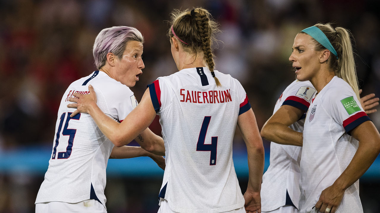 PARIS, FRANCE - JUNE 28: Megan Rapinoe of United States (L) talks to Becky Sauerbrunn of United States (C) during the 2019 FIFA Women's World Cup France Quarter Final match between France and USA at Parc des Princes on June 28, 2019 in Paris, France.