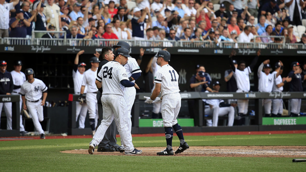 LONDON, ENGLAND - JUNE 30: Gary Sanchez #24 of the New York Yankees is congratulated by Brett Gardner #11 after scoring in the seventh inning of game two of the London Series between the New York Yankees and the Boston Red Sox at London Stadium on Sunday, June 30, 2019 in London, England.