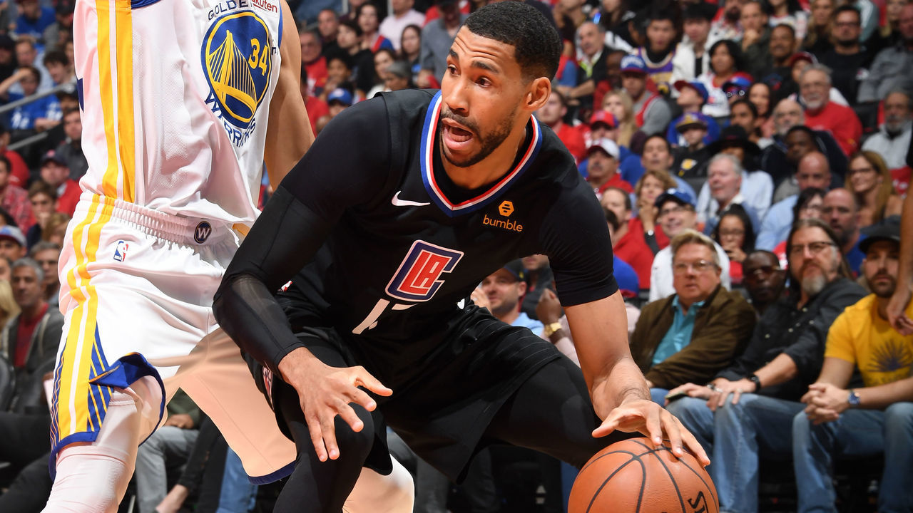 LOS ANGELES, CA - APRIL 21: Garrett Temple #17 of the LA Clippers handles the ball against the Golden State Warriors during Game Four of Round One of the 2019 NBA Playoffs on April 21, 2019 at STAPLES Center in Los Angeles, California. NOTE TO USER: User expressly acknowledges and agrees that, by downloading and/or using this Photograph, user is consenting to the terms and conditions of the Getty Images License Agreement. Mandatory Copyright Notice: Copyright 2019 NBAE