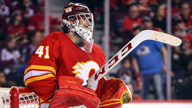 CALGARY, AB - APRIL 19: Calgary Flames Goalie Mike Smith (41) rests between plays during the third period of Game Five of the Western Conference First Round during the 2019 Stanley Cup Playoffs where the Calgary Flames hosted the Colorado Avalanche on April 19, 2019, at the Scotiabank Saddledome in Calgary, AB.