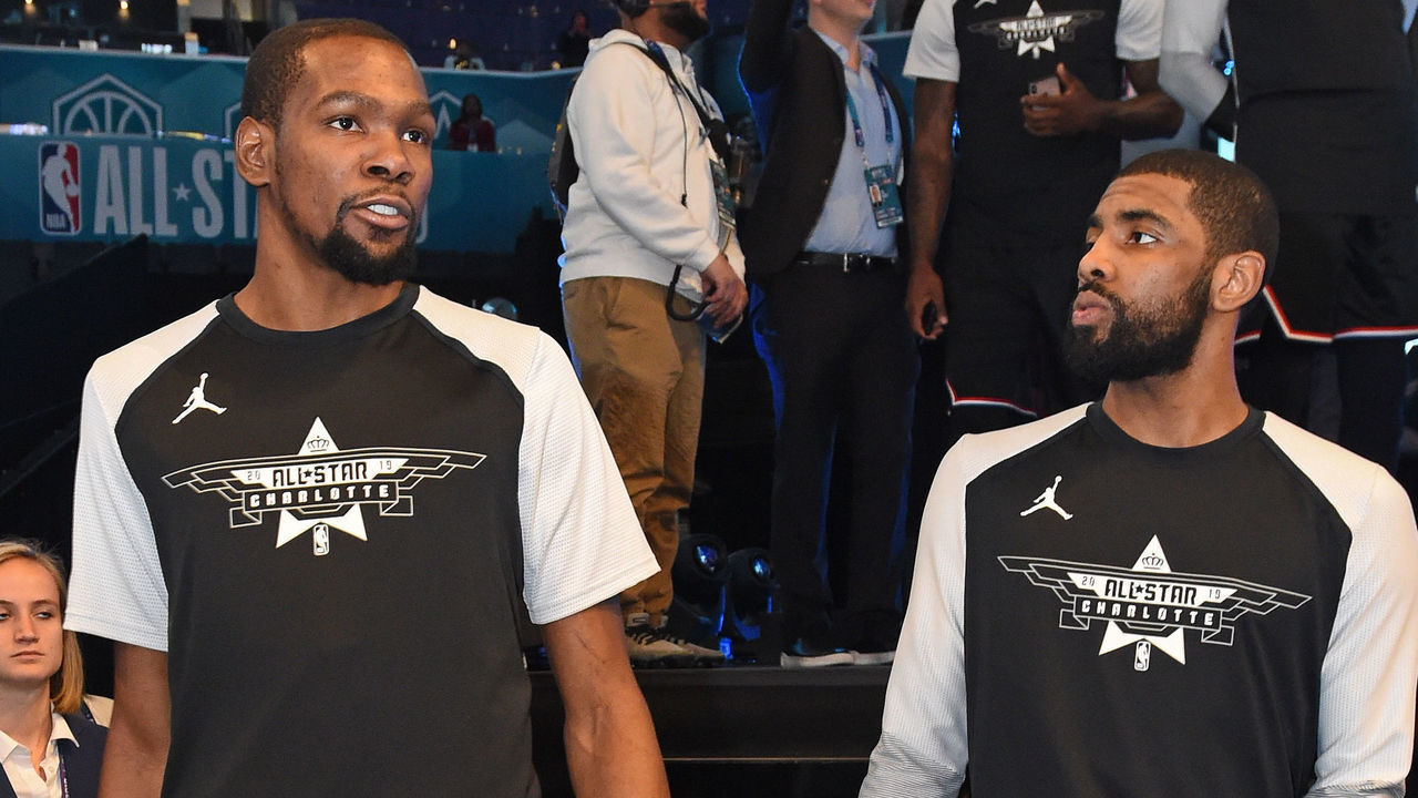 CHARLOTTE, NC - FEBRUARY 17: Kevin Durant #35 and Kyrie Irving #11 of Team LeBron are seen before the game against Team Giannis during the 2019 NBA All-Star Game on February 17, 2019 at Spectrum Center in Charlotte, North Carolina. Mandatory Copyright Notice: Copyright 2019 NBAE