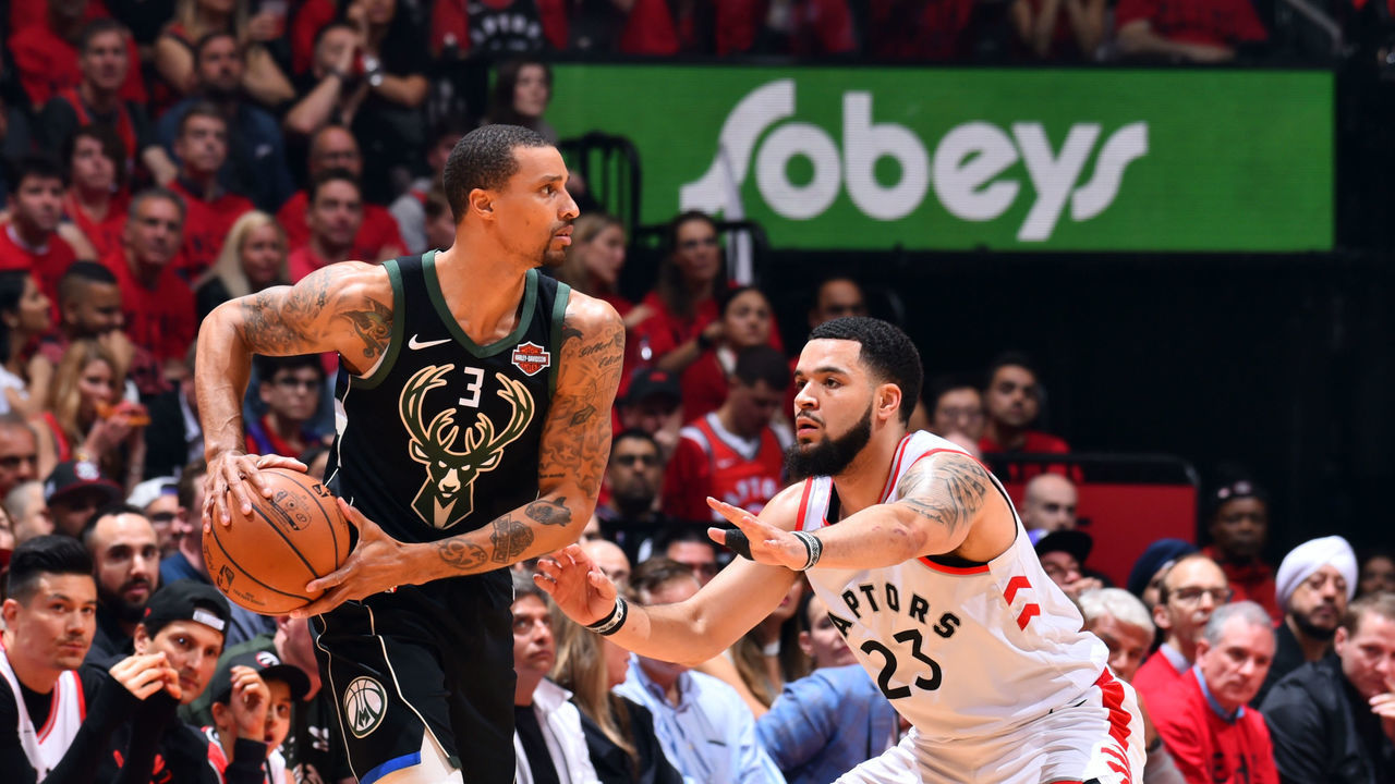 TORONTO, CANADA - MAY 25: George Hill #3 of the Milwaukee Bucks handles the ball against Fred VanVleet #23 of the Toronto Raptors during Game Six of the Eastern Conference Finals on May 25, 2019 at Scotiabank Arena in Toronto, Ontario, Canada. NOTE TO USER: User expressly acknowledges and agrees that, by downloading and/or using this photograph, user is consenting to the terms and conditions of the Getty Images License Agreement. Mandatory Copyright Notice: Copyright 2019 NBAE