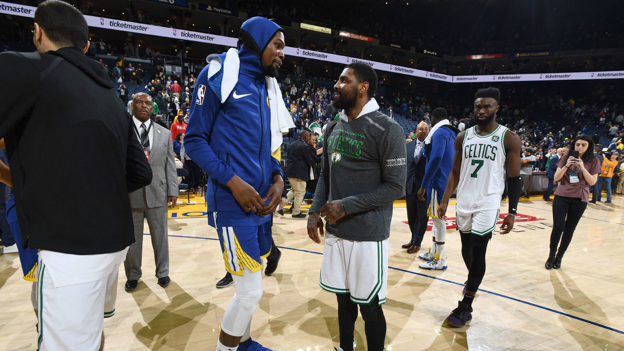 OAKLAND, CA - MARCH 5: Kevin Durant #35 of the Golden State Warriors talks with Kyrie Irving #11 of the Boston Celtics after the game on March 5, 2019 at ORACLE Arena in Oakland, California. NOTE TO USER: User expressly acknowledges and agrees that, by downloading and or using this photograph, user is consenting to the terms and conditions of Getty Images License Agreement. Mandatory Copyright Notice: Copyright 2019 NBAE