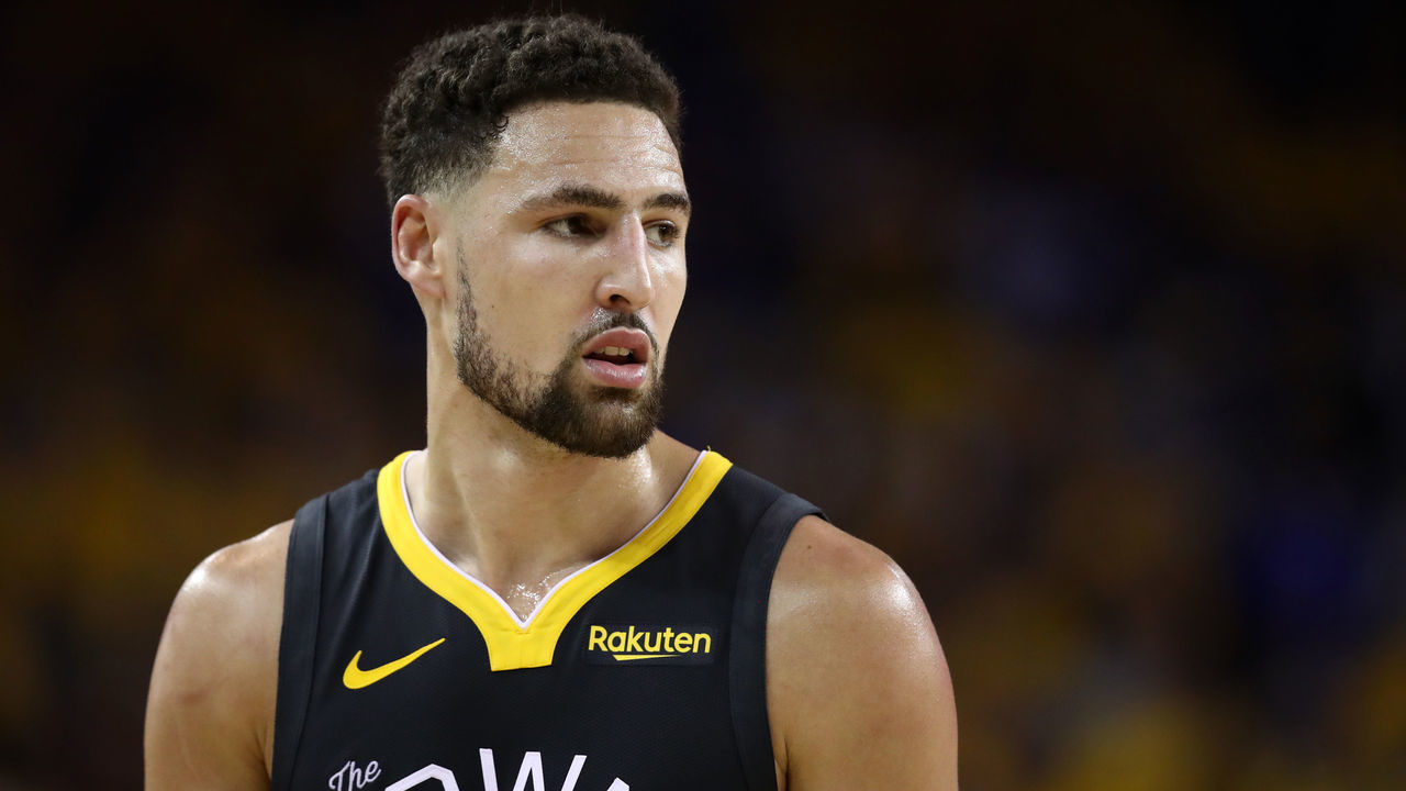 OAKLAND, CALIFORNIA - JUNE 13: Klay Thompson #11 of the Golden State Warriors reacts against the Toronto Raptors in the first half during Game Six of the 2019 NBA Finals at ORACLE Arena on June 13, 2019 in Oakland, California.