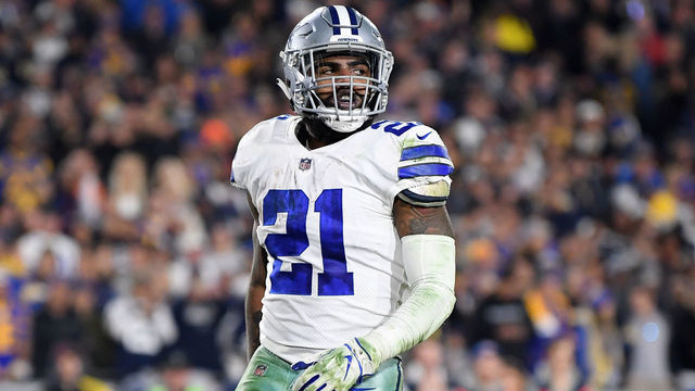 LOS ANGELES, CA - JANUARY 12: Ezekiel Elliott #21 of the Dallas Cowboys celebrates after scoring a 1 yard touchdown in the third quarter against the Los Angeles Rams in the NFC Divisional Playoff game at Los Angeles Memorial Coliseum on January 12, 2019 in Los Angeles, California.