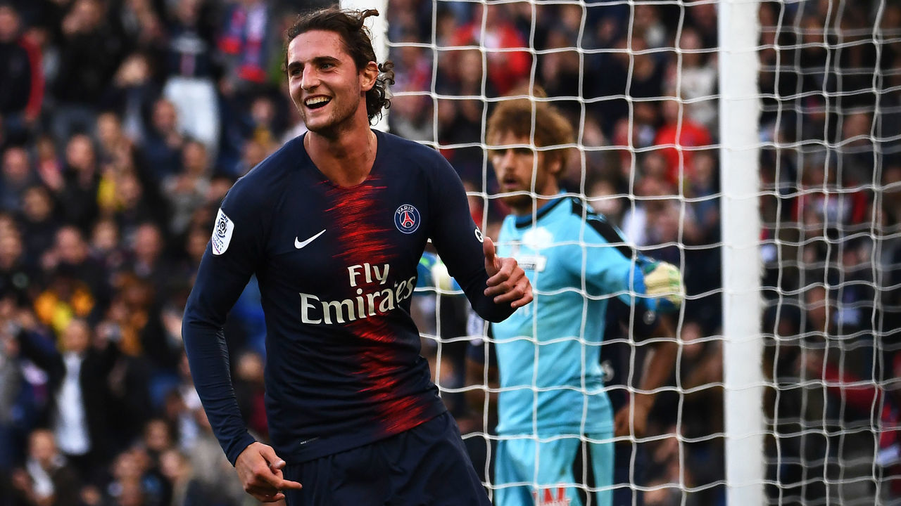 Paris Saint-Germain's French midfielder Adrien Rabiot celebrates after scoring his team's second goal during the French L1 football match between Paris Saint-Germain (PSG) and Amiens at the Parc des Princes stadium in Paris on October 20, 2018.