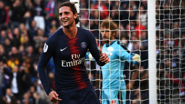 Paris Saint-Germain's French midfielder Adrien Rabiot celebrates after scoring his team's second goal during the French L1 football match between Paris Saint-Germain (PSG) and Amiens at the Parc des Princes stadium in Paris on October 20, 2018.