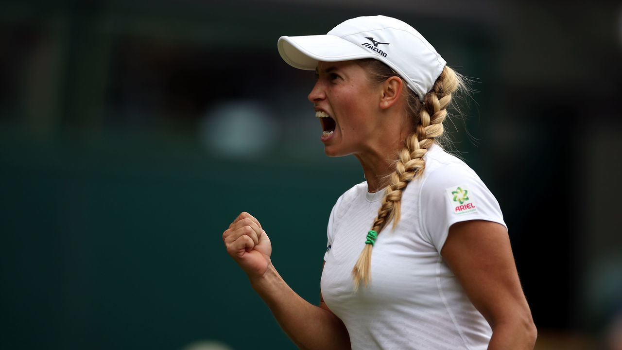 Yulia Putintseva celebrates winning the first set against Naomi Osaka on day one of the Wimbledon Championships at the All England Lawn Tennis and Croquet Club, Wimbledon.
