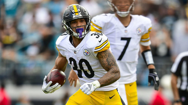 JACKSONVILLE, FL - NOVEMBER 18: James Conner #30 of the Pittsburgh Steelers runs with the ball during the second half against the Jacksonville Jaguars at TIAA Bank Field on November 18, 2018 in Jacksonville, Florida.