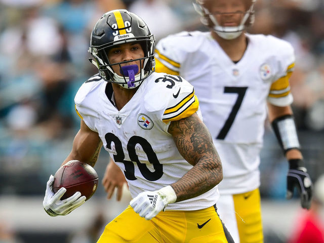 JACKSONVILLE, FL - NOVEMBER 18: James Conner #30 of the Pittsburgh Steelers runs with the ball during the second half against the Jacksonville Jaguars at TIAA Bank Field on November 18, 2018 in Jacksonville, Florida.
