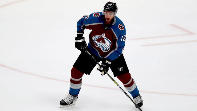 DENVER, COLORADO - MAY 06: Patrik Nemeth #12 of the Colorado Avalanche advances the puck against the San Jose Sharks in the first period during Game Six of the Western Conference Second Round during the 2019 NHL Stanley Cup Playoffs at the Pepsi Center on May 6, 2019 in Denver, Colorado.