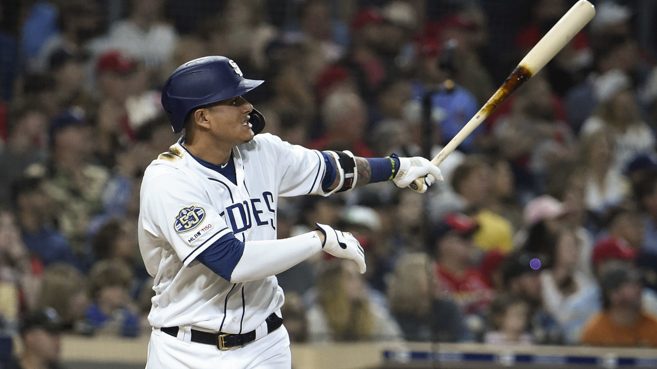 SAN DIEGO, CA - JUNE 29: Manny Machado #13 of the San Diego Padres hits a solo home run during the fourth inning of a baseball game against the St. Louis Cardinals at Petco Park June 29, 2019 in San Diego, California. The home was the second of the night for Machado.