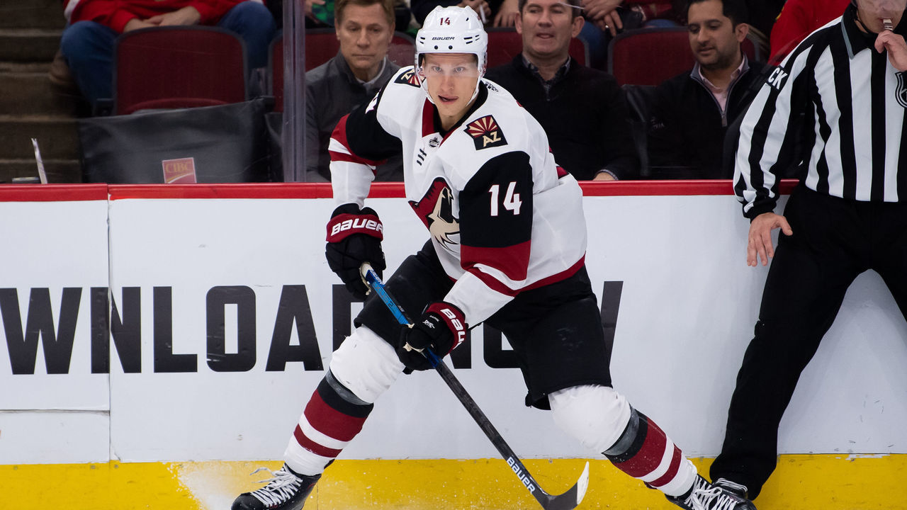CHICAGO, IL - MARCH 11: Arizona Coyotes right wing Richard Panik (14) controls the puck during a game between the Arizona Coyotes and the Chicago Blackhawks on March 11, 2019, at the United Center in Chicago, IL.