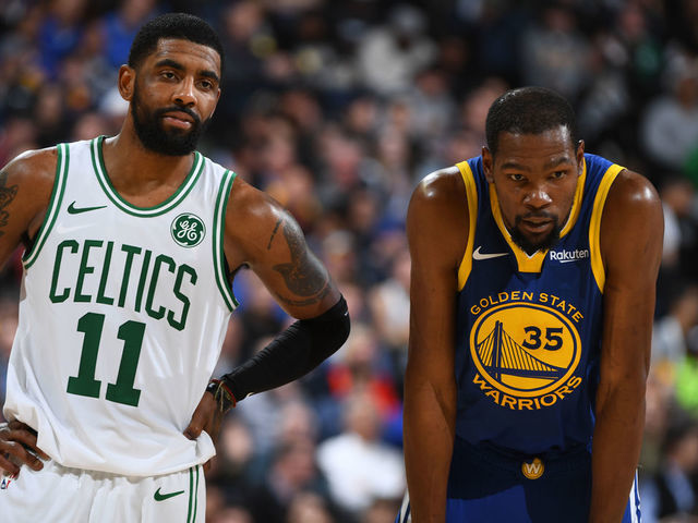 OAKLAND, CA - MARCH 5: Kyrie Irving #11 of the Boston Celtics and Kevin Durant #35 of the Golden State Warriors looks on during the game on March 5, 2019 at ORACLE Arena in Oakland, California. NOTE TO USER: User expressly acknowledges and agrees that, by downloading and or using this photograph, user is consenting to the terms and conditions of Getty Images License Agreement. Mandatory Copyright Notice: Copyright 2019 NBAE