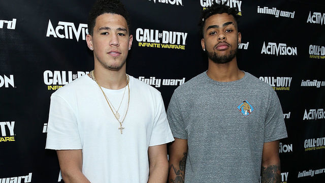 WOODLAND HILLS, CA - APRIL 18: (L-R) Pro Basketball Players D'Angelo Russell and Devin Booker visit Infinity Ward for a "Call of Duty: Infinite Warfare Continuum DLC" livestream on April 18, 2017 in Woodland Hills, California.