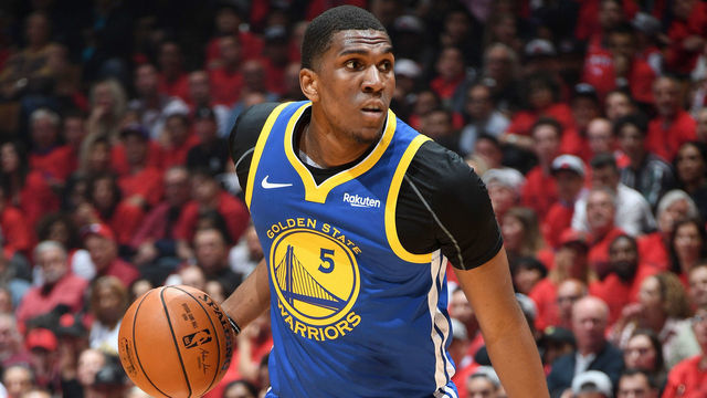 TORONTO, CANADA - JUNE 10: Kevon Looney #5 of the Golden State Warriors handles the ball against the Toronto Raptors during Game Five of the NBA Finals on June 10, 2019 at Scotiabank Arena in Toronto, Ontario, Canada. NOTE TO USER: User expressly acknowledges and agrees that, by downloading and/or using this photograph, user is consenting to the terms and conditions of the Getty Images License Agreement. Mandatory Copyright Notice: Copyright 2019 NBAE