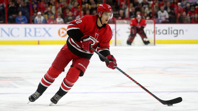 RALEIGH, NC - MARCH 19: Sebastian Aho #20 of the Carolina Hurricanes controls the puck on the ice during an NHL game against the Pittsburgh Penguins on March 19, 2019 at PNC Arena in Raleigh, North Carolina.