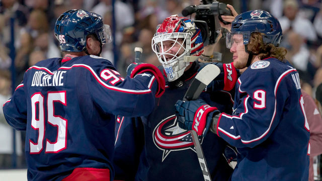COLUMBUS, OH - APRIL 16: Columbus Blue Jackets goaltender Sergei Bobrovsky (72) celebrates with Columbus Blue Jackets center Matt Duchene (95) and Columbus Blue Jackets left wing Artemi Panarin (9) after winning the Stanley Cup first round playoff game four between the Columbus Blue Jackets and the Tampa Bay Lightning on April 16, 2019 at Nationwide Arena in Columbus, OH.