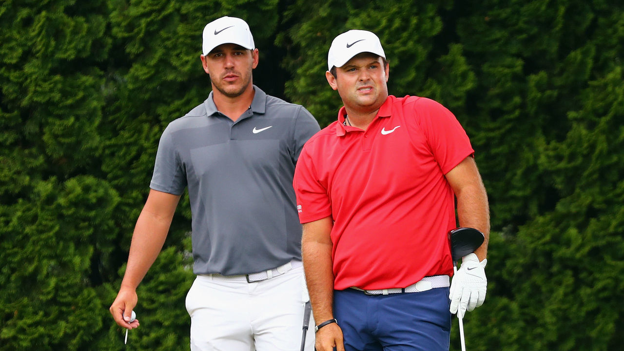 CROMWELL, CT - JUNE 22: Brooks Koepka and Patrick Reed of the United States stand on the 9th tee during the second round of the Travelers Championship at TPC River Highlands on June 22, 2018 in Cromwell, Connecticut.