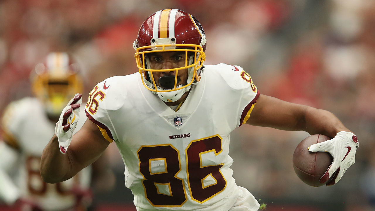 GLENDALE, AZ - SEPTEMBER 09: Tight end Jordan Reed #86 of the Washington Redskins runs with the football after a reception against the Arizona Cardinals during the NFL game at State Farm Stadium on September 9, 2018 in Glendale, Arizona. The Redskins defeated the Cardinals 24-6.