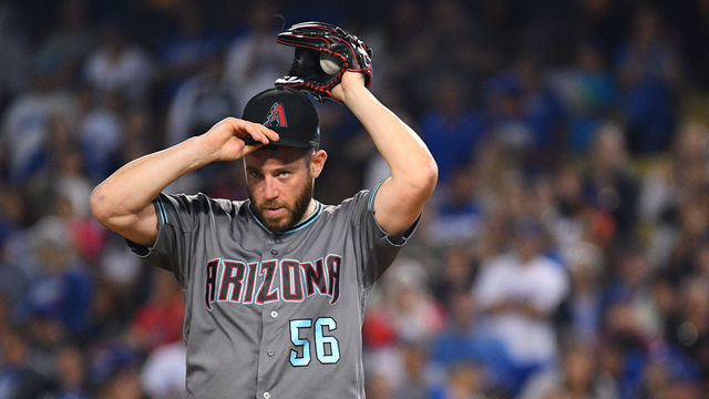 LOS ANGELES, CA - JULY 02: Arizona Diamondbacks pitcher Greg Holland (56) looks on during a MLB game between the Arizona Diamondback and the Los Angeles Dodgers on July 2, 2019 at Dodger Stadium in Los Angeles, CA.