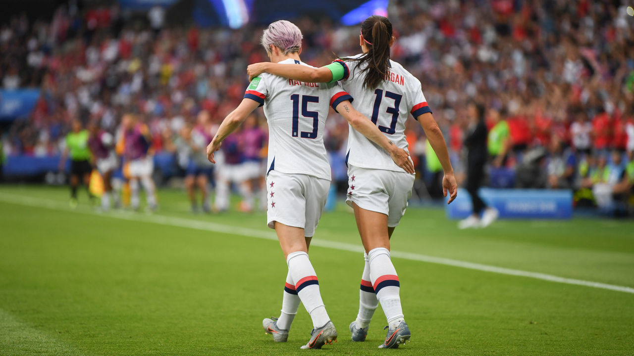 PARIS, FRANCE - JUNE 28: Megan Rapinoe #15 of the United States celebrates scoring with teammate Alex Morgan #13 during a 2019 FIFA Women's World Cup France quarter-final match between France and the United States at Parc des Princes on June 28, 2019 in Paris, France. .