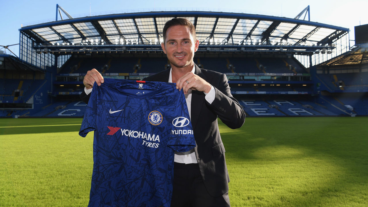 LONDON, ENGLAND - JULY 03: New Chelsea manager Frank Lampard holds the Chelsea shirt as he is announced as new manager of Chelsea FC at Stamford Bridge on July 3, 2019 in London, England.